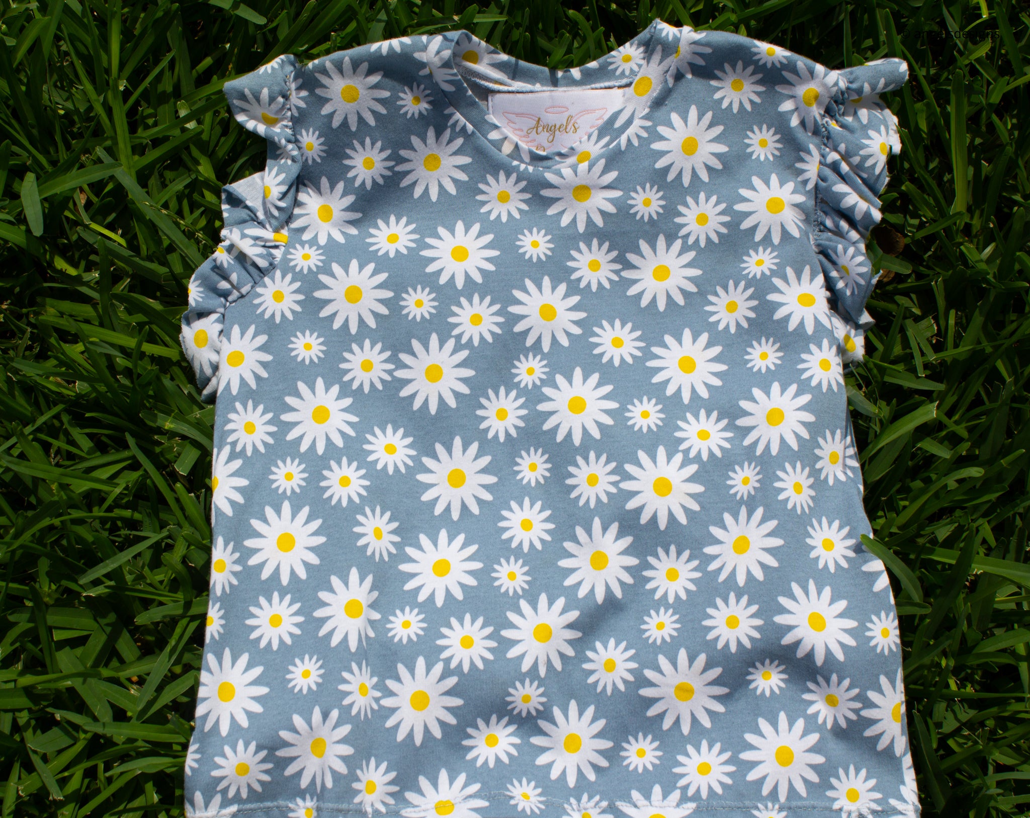 Girl's ruffled sleeve flower top