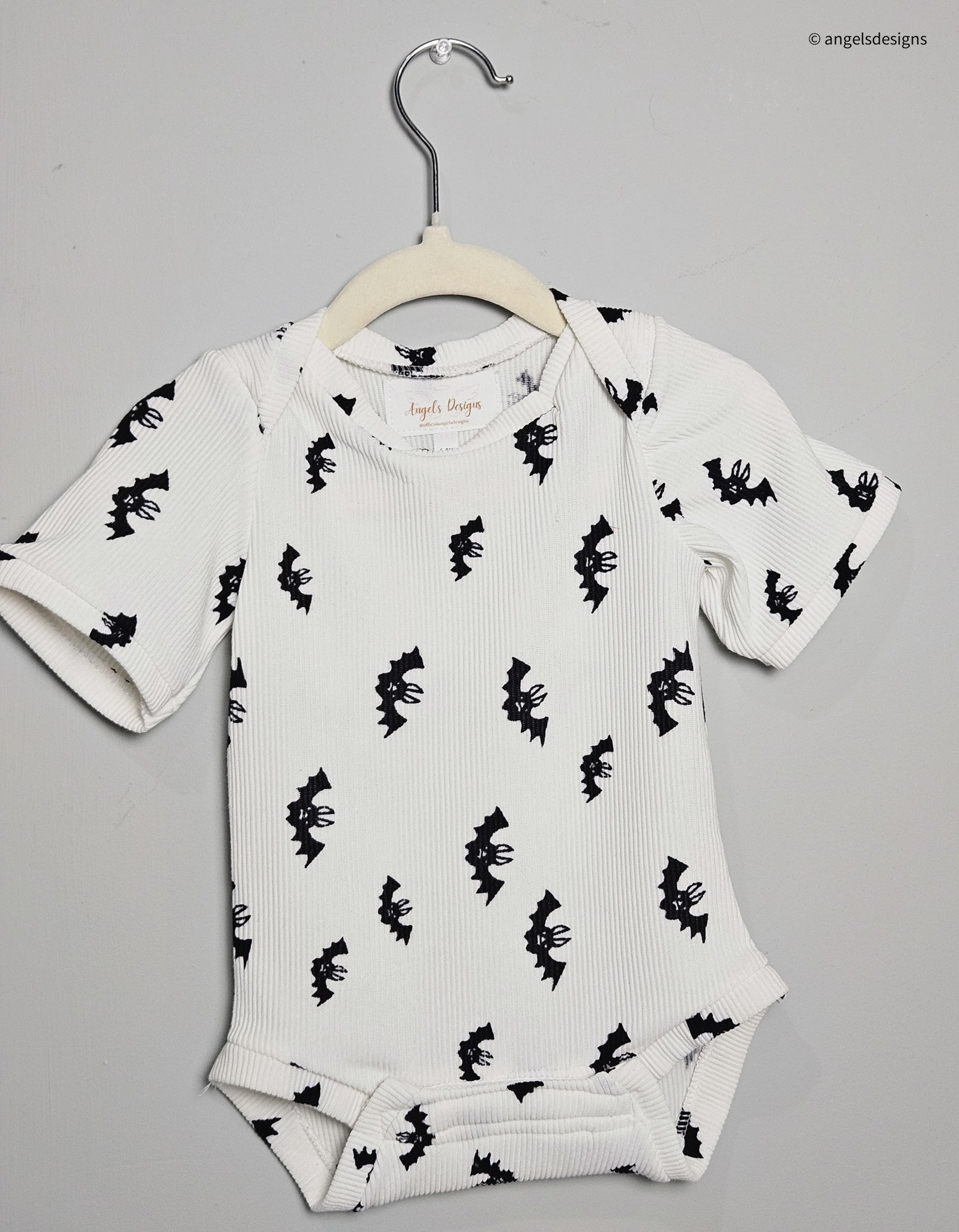 Boy's Bat pattern onesie