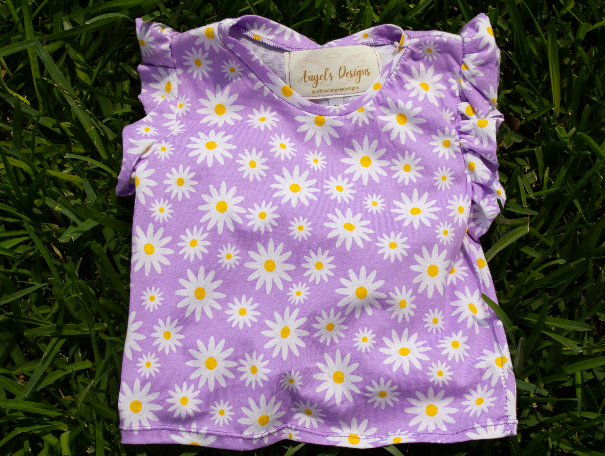 Girl's ruffled sleeve flower top
