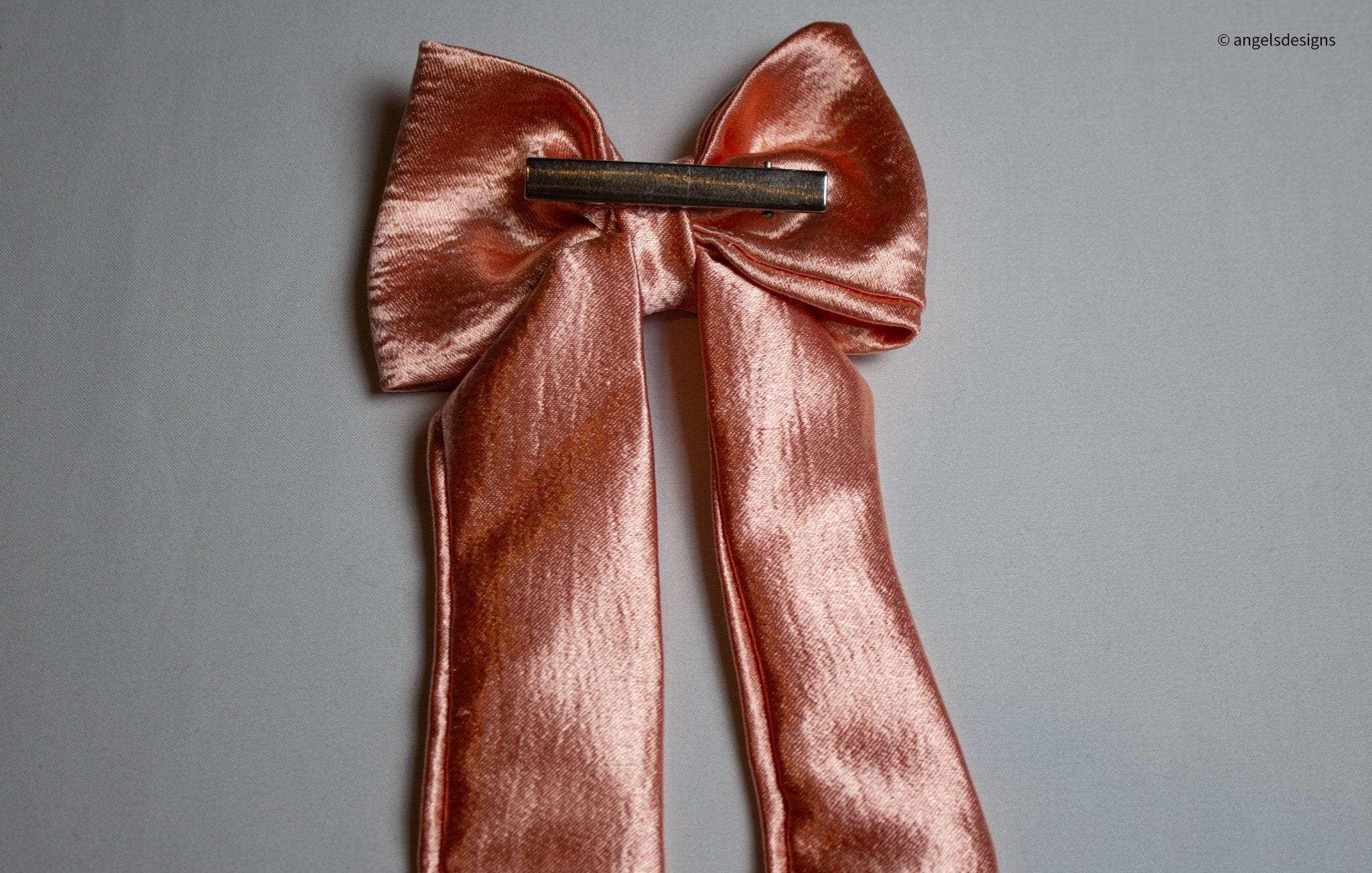 Little Girl's Pink Satin hair bow with tails