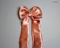 Little Girl's Pink Satin hair bow with tails