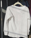 Girl's white long sleeve top