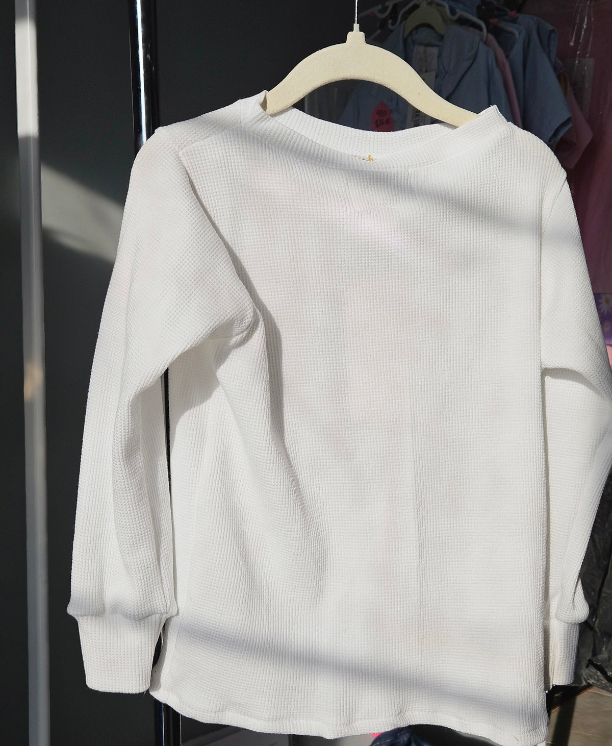 Girl's white long sleeve top